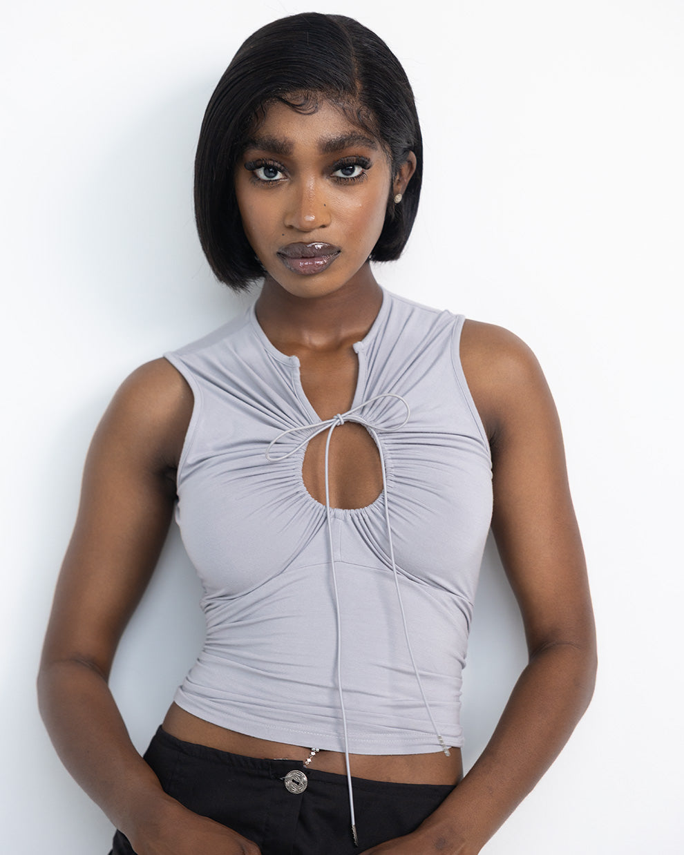 Close-up of Dormeleven gray keyhole tank top showing fabric texture and keyhole detail at the neckline.