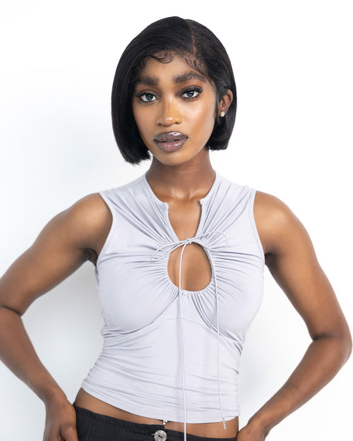 Grey keyhole tank top by DORMELEVEN, featuring a stylish keyhole neckline and sleeveless design, laid flat on a white background.